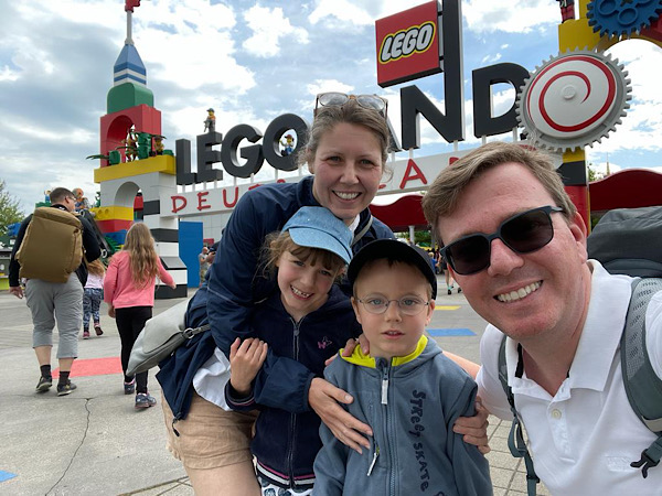 Family standing in front of Legoland